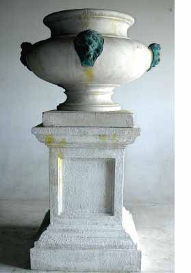 cast stone urn on pedestal