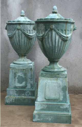 cast stone urns on pedestal